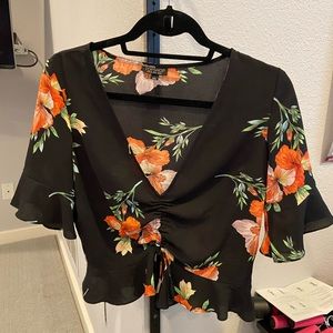 Black floral blouse